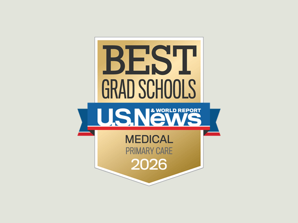 Gold shield badge with text: "Best Grad Schools, U.S. News & World Report, Medical Primary Care, 2026.