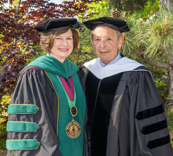 A man and woman posing for a photo.