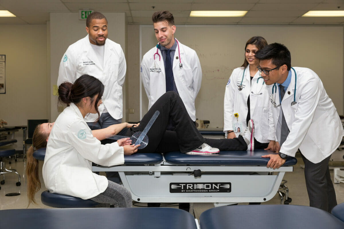 doctors, woman, table.