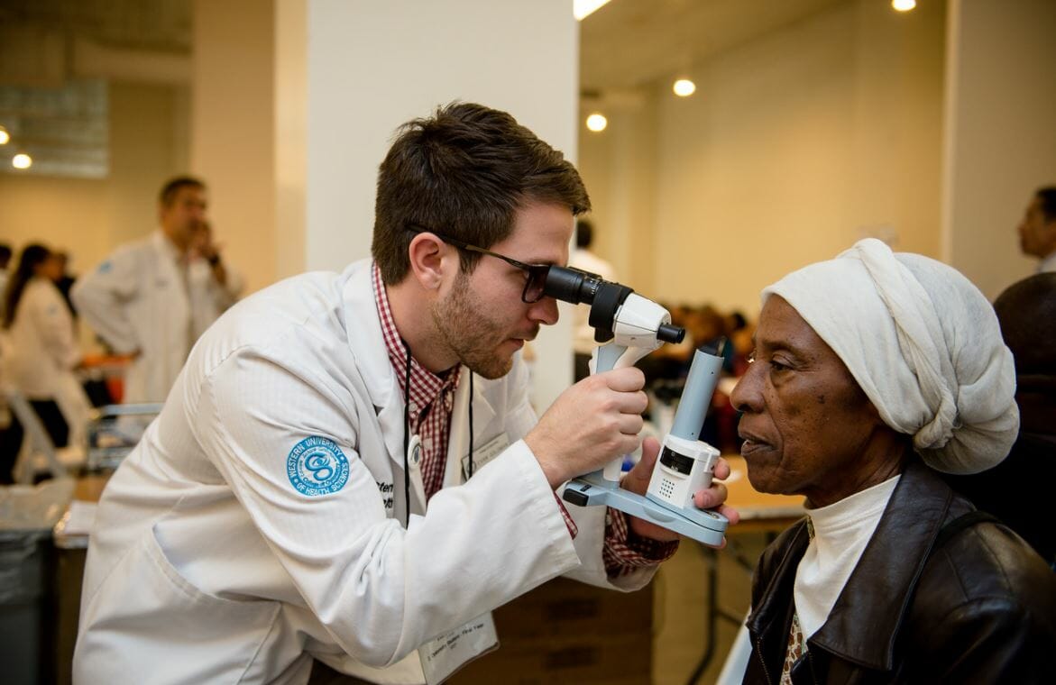 Care Harbor LA 2017 Care Harbor LA 2017 College of Optometry third-year student Evan Goldman examines the eyes of patient Paula Robinson of Los Angeles - Western University of Health Sciences is playing a key role in delivering services to Care Harbor patients during the event at The REEF Exposition Hall in Los Angeles