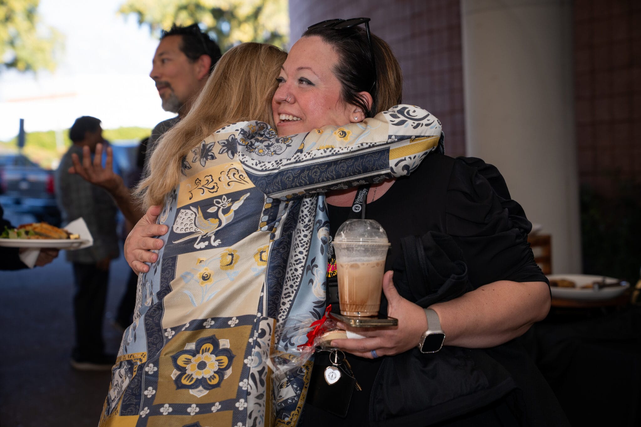 two female friends hugging