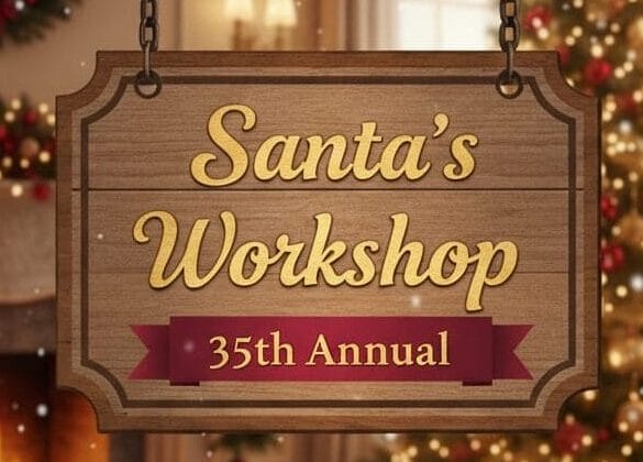 A wooden sign reading "Santa’s Workshop 35th Annual" hangs in a festive living room decorated with a Christmas tree, fireplace, and holiday garlands.