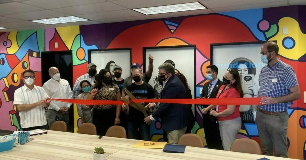 The School of Arts and Enterprise held a ribbon cutting ceremony for SAE Create on Feb. 12, 2022. WesternU Chief of Community and Governmental Affairs Jeff Keating, MA, is cutting the ribbon.